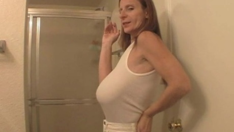 GILF with saggy boobs in a T-shirt